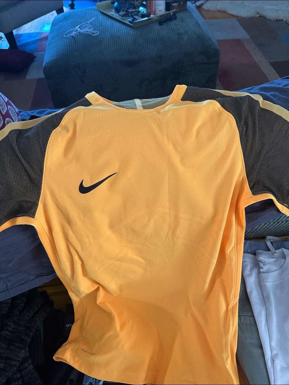 Nike Men’s orange and black Short Sleeve Training Jersey